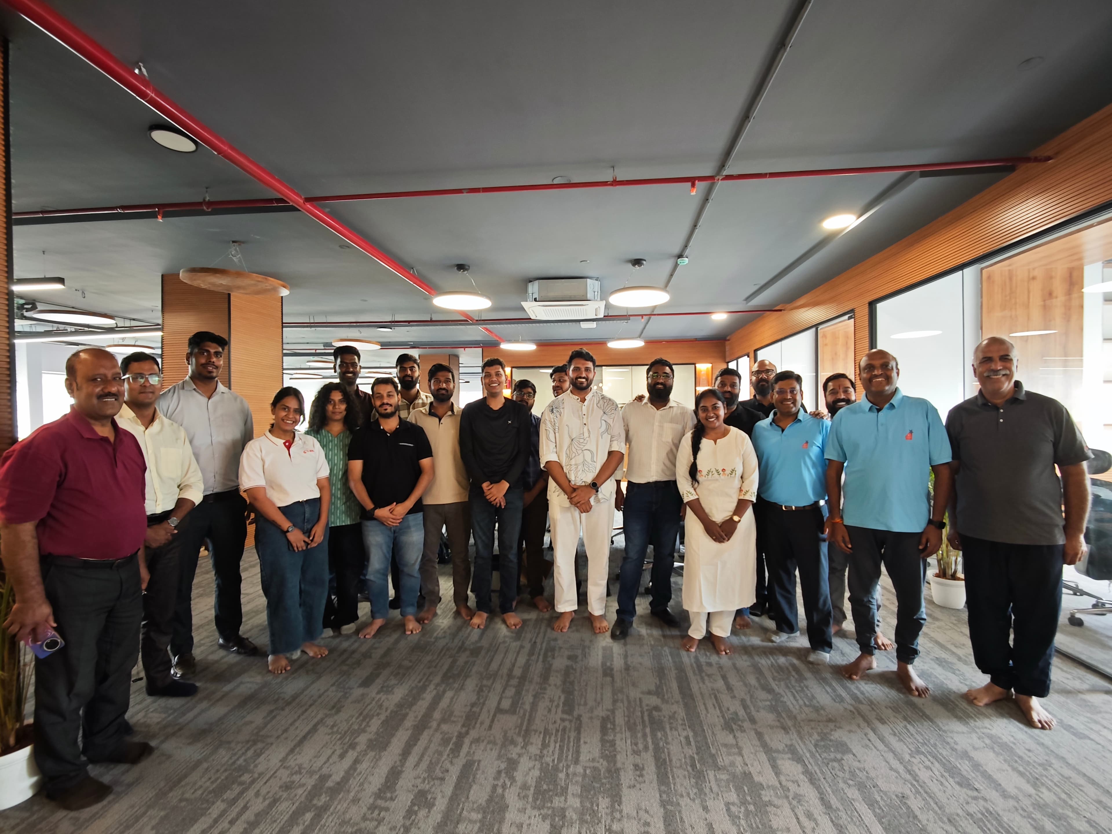Corporate wellbeing session participants gathered together after their practice