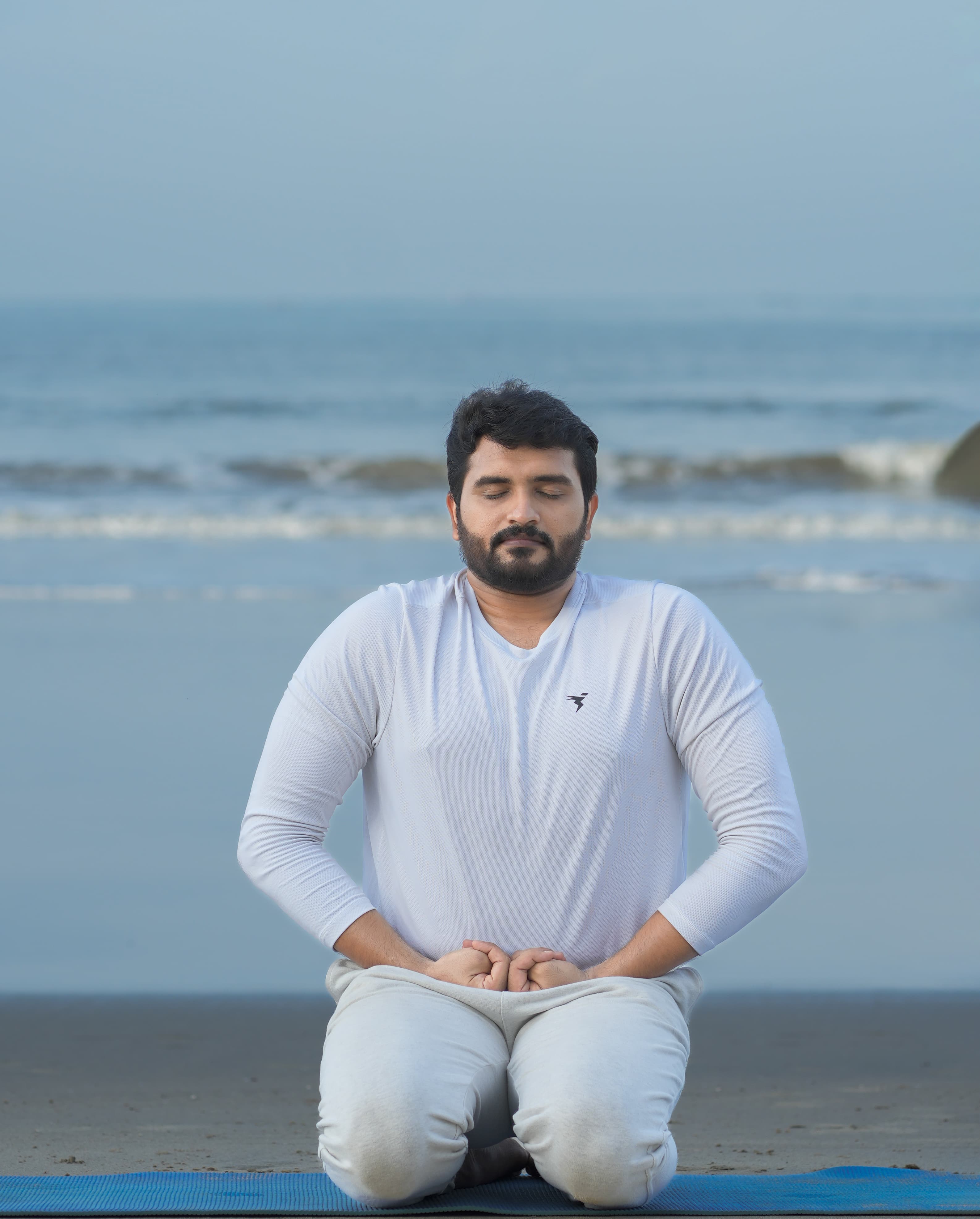 A quiet seated meditation practice beside the sea