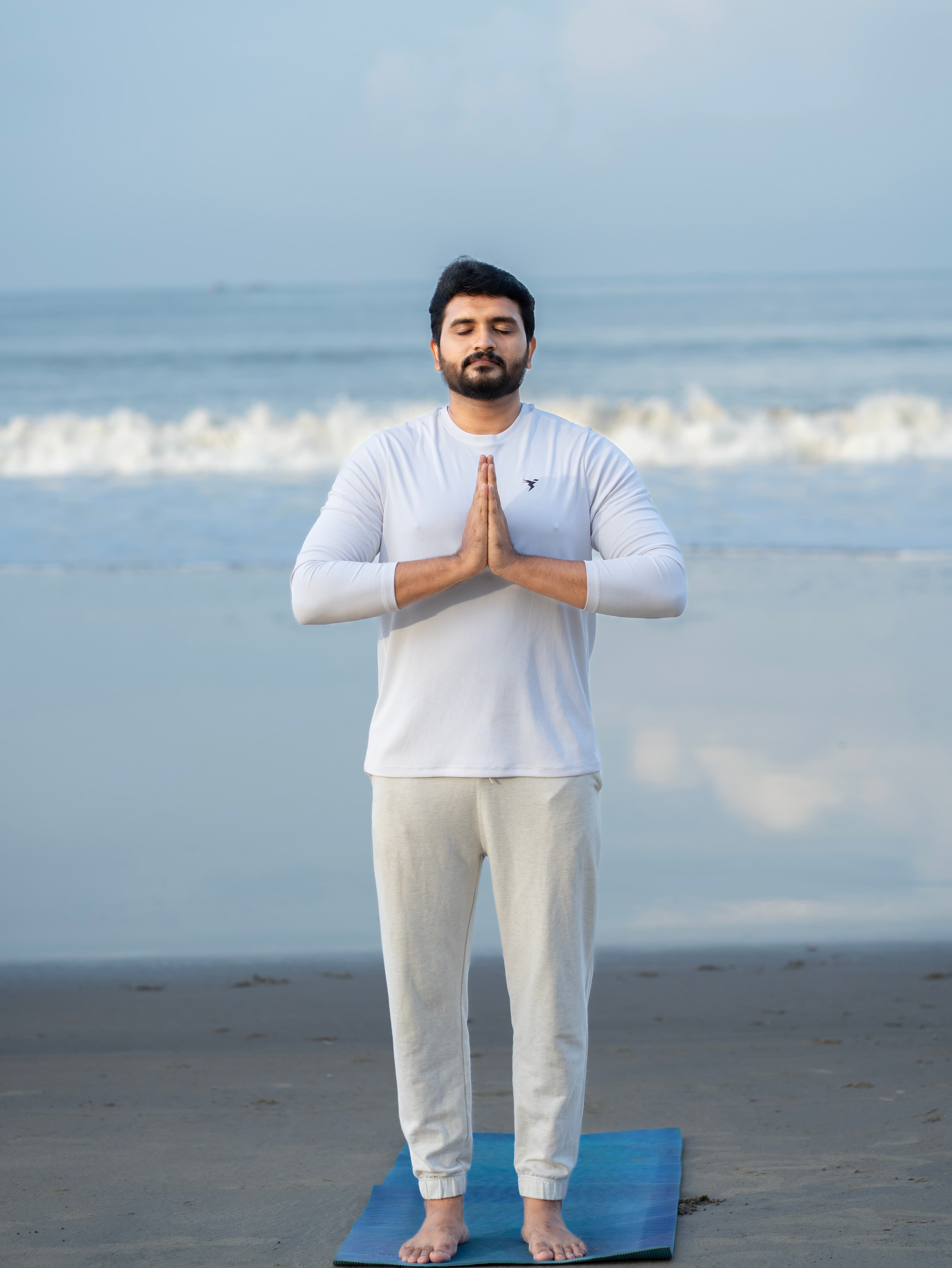 Yoga practice beside the sea